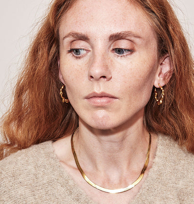 Bonnie Halsband, Guld